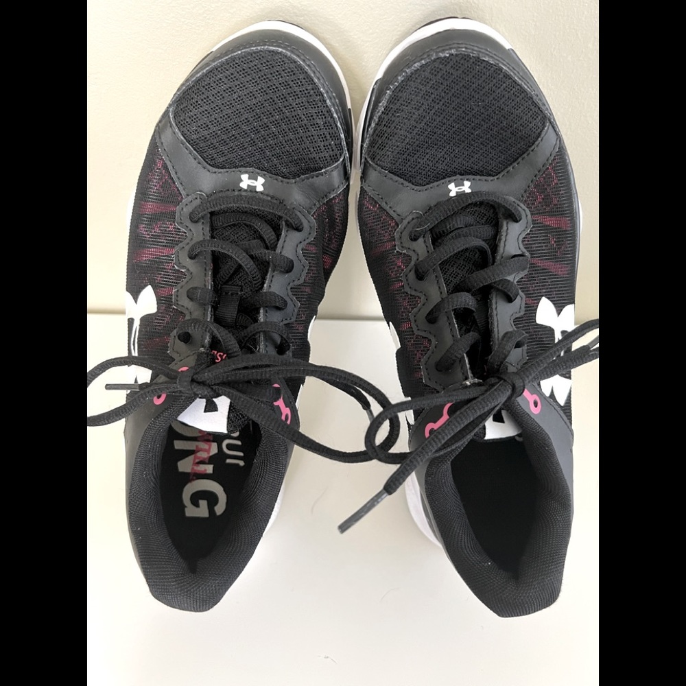Under armor tennis shoes.